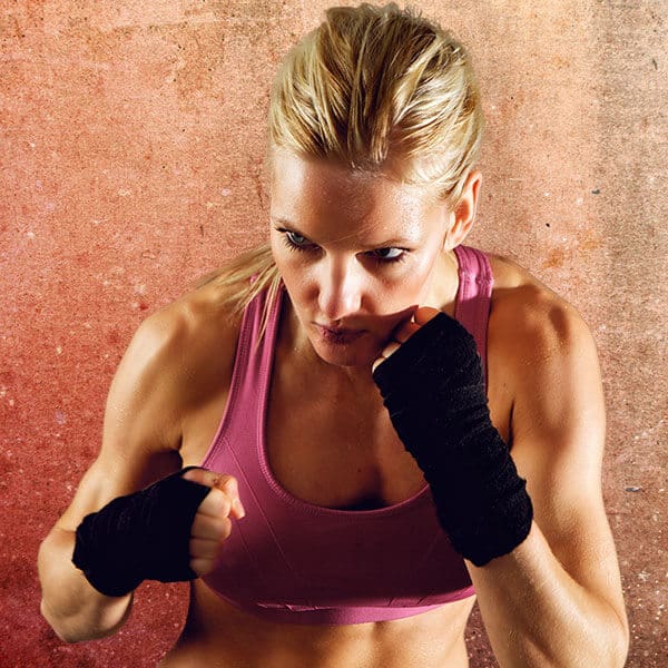 Mixed Martial Arts Lessons for Adults in Ladera Ranch CA - Lady Kickboxing Focused Background
