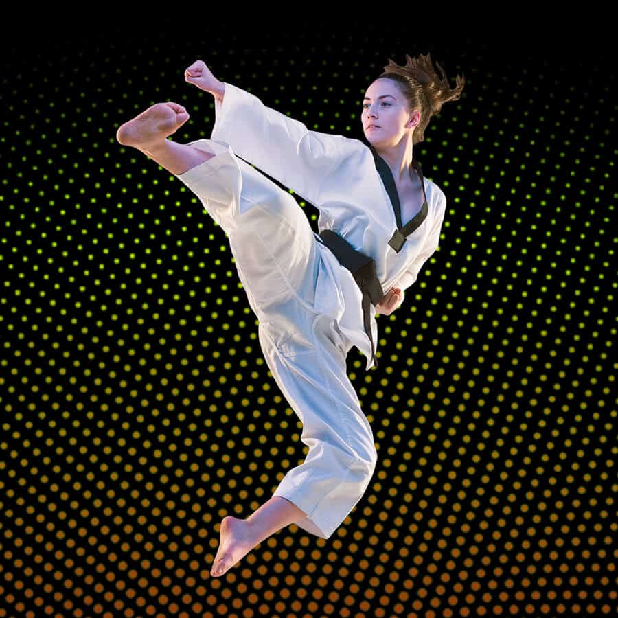 Martial Arts Lessons for Adults in Ladera Ranch CA - Girl Black Belt Jumping High Kick