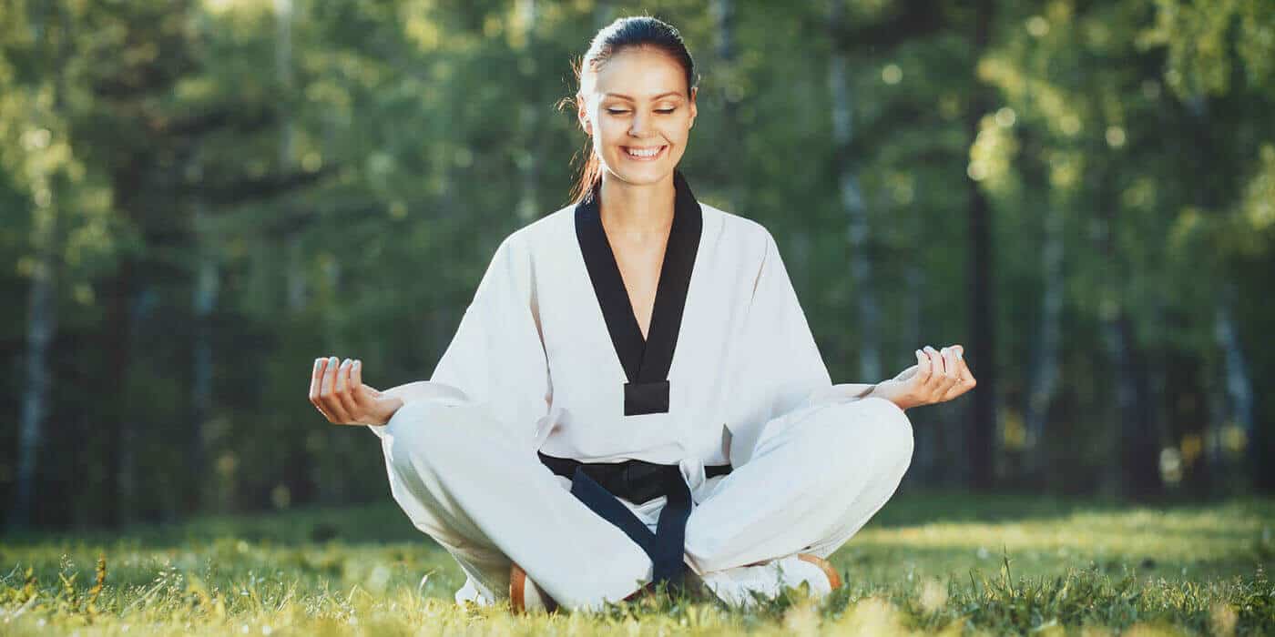 Martial Arts Lessons for Adults in Ladera Ranch CA - Happy Woman Meditated Sitting Background
